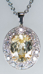 Natural yellow zircon & diamond pendant in platinum