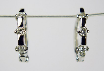 Diamond hoop earrings - Simple delicate diamond earrings set with 0.25ct diamonds in 18ct white gold