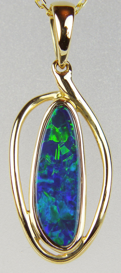 Opal doublet pendant in 14ct gold - Elegant opal doublet pendant in 14ct yellow gold. Variety of chains available to suit (at extra charge). Pendant measures  30 x 14mm
