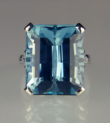 Aquamarine & diamond ring in platinum - 17.85ct aquamarine cut by Thoma Trozzo, stone of exceptionally fine colour and quality, flanked by a 0.34ct pair of kite cut diamonds in E colour VVS clarity, mounted as a ring in platinum