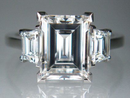 3.43ct baguette cut diamond ring with 0.73ct trapezoidal diamonds in platinum - Stunning top quality G colour VS2 clarity 3.43ct baguette cut diamonds (with HRD report),  flanked by a 0.73ct matched pair of trapezoidal cut diamonds in G colour VS1 clarity, mounted in an elegant platinum ring. Total diamond weight in the ring is 4.16ct.