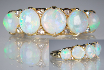 antique opal & diamond ring in 18ct yellow gold - Fabulous quality, with little or no signs of wear, this lovely five stone opal ring is set with little diamond chips in a finely worked ornate gallery. 