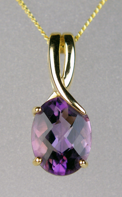 Chequerboard amethyst oval pendant in 9ct yellow gold - Sparkling chequerboard cut amethyst set in 9ct yellow gold and suspended from a 9ct yellow gold chain. Pendant is 17mm long and 8mm wide