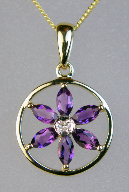 Amethyst & diamond flower pendant - Pretty amethyst & diamond pendant set in 9ct yellow gold, suspended from an 18" 9ct yellow gold chain
