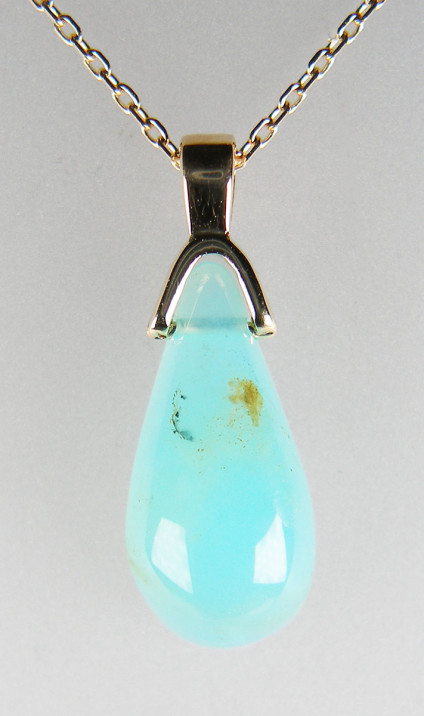 Peruvian opal pendant in 9ct yellow gold - Exquisitely coloured turquoise Peruvian opal drop carved by US company 'Out of Our Mines' set in 9ct yellow gold pendant and suspended from 20" 9ct yellow gold chain. Pendant is £199, chain £110, both for sale separately and different chain lengths available. Pendant 24 x 9mm