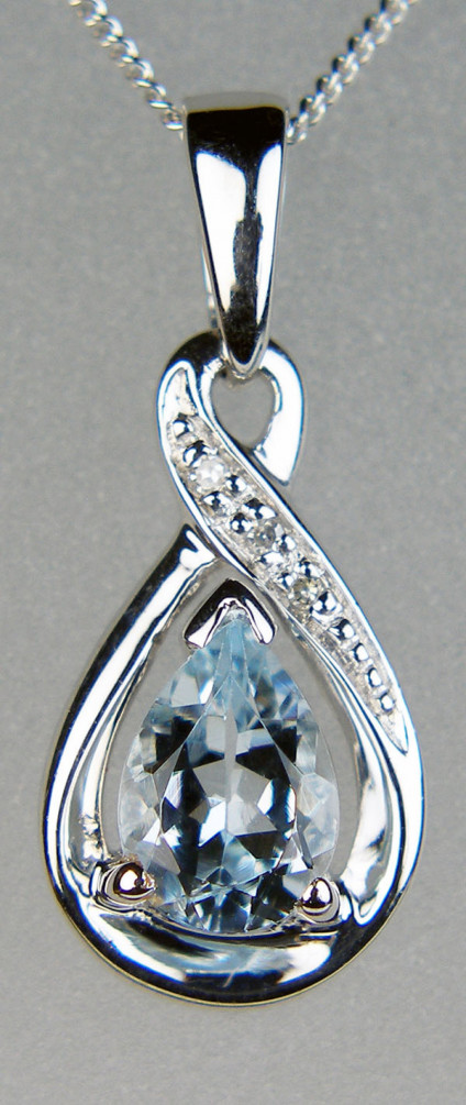 Aquamarine & diamond pendant in 9ct white gold - Drop shaped aquamarine & diamond pendant in 9ct white gold, suspended from an 18" 9ct white gold chain