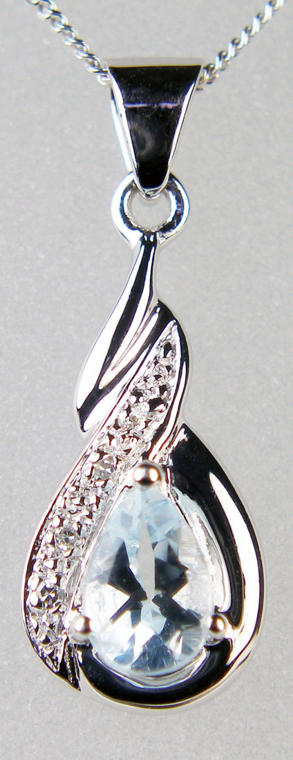 Aquamarine & diamond pendant in 9ct white gold - Dainty pear cut aquamarine set with diamonds in 9ct white gold and suspended from an 18" 9ct white gold chain
