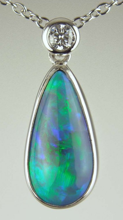 Black opal & diamond pendant - 2.52ct pear cut cabochon black opal set with 0.09ct diamond FG/VS in 18ct white gold on 18ct white gold adjustable chain