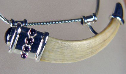 Boar's tusk pendant set with garnets in silver - Unusual commission!  Medieval boar's tusk set in silver with cabochon garnets.