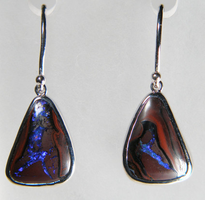 Boulder opal eardrops in silver - 16.76ct yowah nut dark boulder opals from Queensland, Australia, rubover set in polished silver and suspended from silver silver hooks. Opals are 15x19mm.