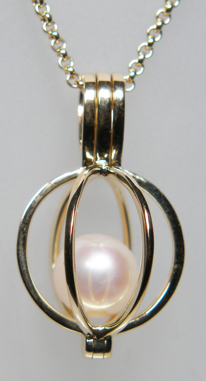 Caged pearl in 9ct yellow gold pendant - Stylish and understated 8.5mm undrilled,loose freshwater cultured pearl in 9ct yellow gold opening caged pendant £395, suspended from 18-20" belcher link 9ct yellow gold chain £230