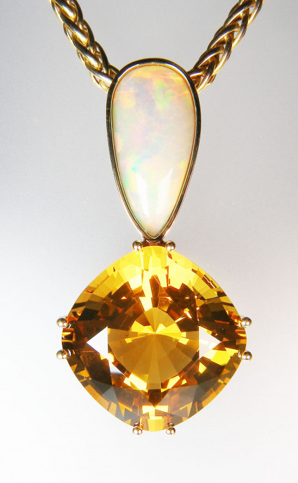 Citrine & Ethiopian opal pendant in 18ct yellow gold - Big pendant for a customer that likes statement jewellery! Exceptional quality and beautifully cut, large cushion cut citrine of 36.11ct set below a 5.64ct Ethiopian opal pear cabochon and mounted in 18ct yellow gold. Chain is not included in the price.