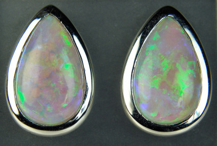 Crystal opal earstuds in 18ct white gold - 4.76ct pear cut cabochon Australian crystal opal rubover set in 18ct white gold 16 x 11mm.