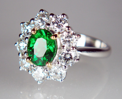 Tsavorite & diamond cluster ring - Beautiful vivid green tsavorite garnet 1.52ct oval, set with 1.5ct of round brilliant cut diamonds in 18ct white gold
