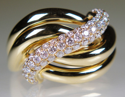 Swirly diamond ring in 18ct yellow gold - Unusual and elegant scroll style ring in 18ct yellow gold set with 0.62ct diamonds