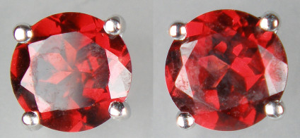 Garnet earstuds in 18ct white gold - 6mm round cut good red garnets mounted as earstuds in 18ct white gold