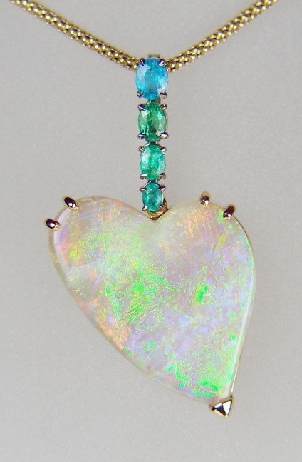 Opal & Paraiba tourmaline pendant - Heart shaped opal drop suspended from 1ct of oval cut Paraiba tourmalines, set in 18ct yellow and white gold