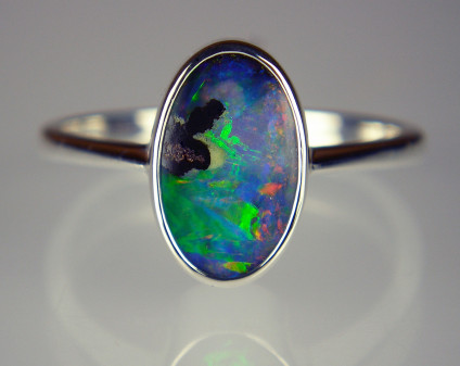 Boulder opal ring in silver - Sweetly simple little boulder opal from Queensland set in a rubover silver ring