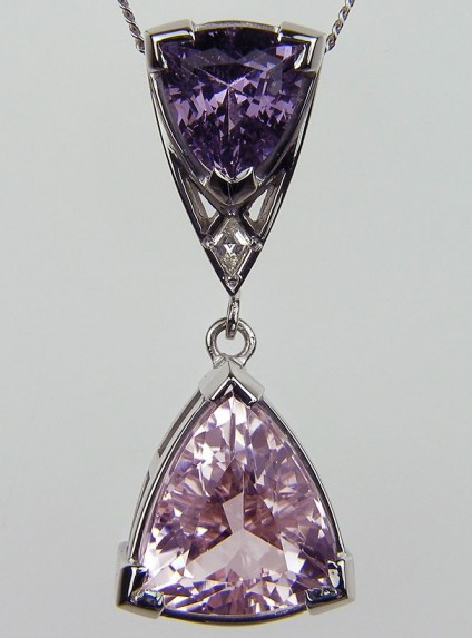 Morganite, spinel & diamond pendant - Morganite, Spinel & Diamond Pendant. Pendant of 5.44ct triangular morganite (pink beryl) set with 2.59ct triangular lilac spinel and 0.06ct kite shaped diamond in 18carat white gold. 35 x 14mm.
