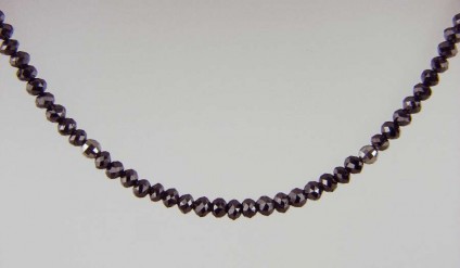Black Diamond Necklace 21.75ct - 21.75ct of faceted black diamond beads set with 14ct white gold faceted beads on a frosted 14ct white gold clasp