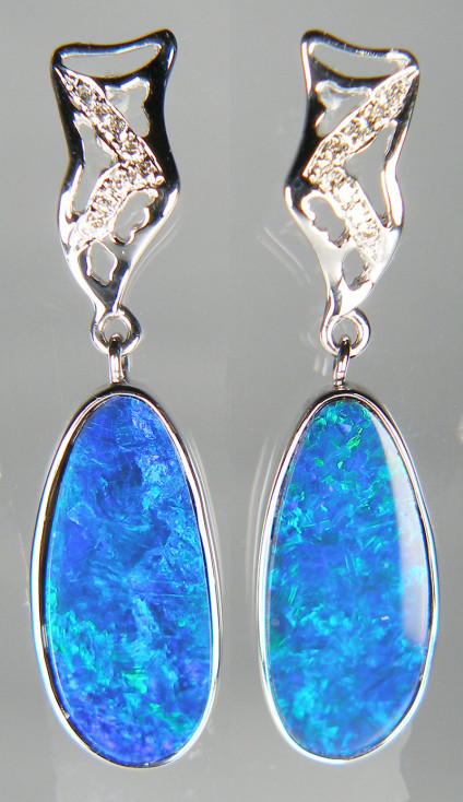 Opal doublet & diamond eardrops in 14ct white gold - Lovely blue and green slender drop shaped opal doublet pair rubover set in 14ct white gold earrings with small diamond accents. Earrings measure 9 x 35mm.
