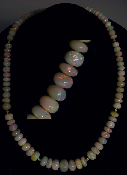Ethiopian Opal Necklace - Superb quality opal bead necklace made with graduated polished Ethiopian opal beads totalling 225ct weight and interspersed with 18ct yellow gold handmade beads;  14ct T bar clasp.