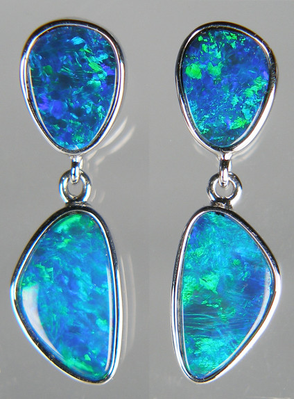 Opal doublet double drop earrings in 14ct white gold - Vividly coloured green and blue opal doubles set in 14ct white gold eardrops measuring 7 x 24mm.