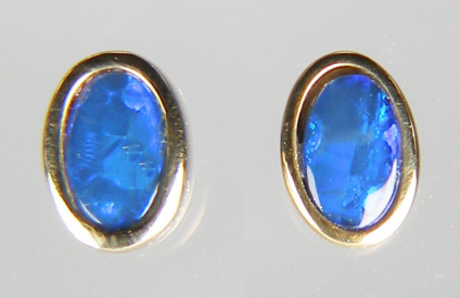 Tiny blue opal doublet earstuds in 9ct yellow gold - 6x3mm oval opal doublet earstdus in 9ct yellow gold