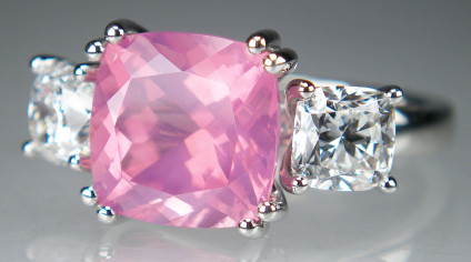 Pink spinel & cushion cut diamond ring in platinum - Pink opalescent cushion cut spinel weighing 4.50ct accompanied by DSEF report confirming Tanzanian origina and natural unheated, flanked by a 1.61ct matched pair of cushion cut diamonds in F colour VVS clarity, mounted in platinum. This is an exceptionally rare and beautiful pink spinel, and is a real investment piece.
