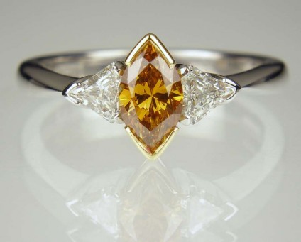 Orange diamond ring - 0.55ct natural orange diamond marquise set with 0.28ct kite cut white diamond pair F colour VS clarity in 18ct white gold