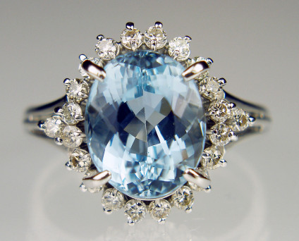 Oval aquamarine & diamond ring in platinum - 3.84ct oval aquamarine mounted with 0.46ct of G colour VS clarity round brilliant cut diamonds in platinum ring