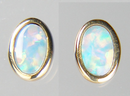 Tiny opal doublet earstuds in 9ct yellow gold - 6 x 3mm oval opal doublet earstuds in 9ct yellow gold