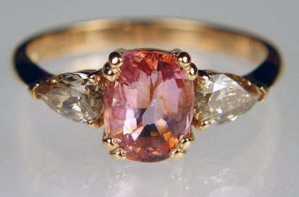 Padparadscha sapphire & cinnamon diamond ring - Rectangular cushion cut 1.48ct peach pink sapphire flanked by a 0.51ct pair of pear cut brown diamonds mounted in 18ct rose gold ring