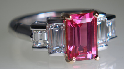 Spinel & baguette cut diamond ring - Ring in platinum & 18ct rose gold set with a 2.35ct emerald cut Mehenge spinel, from Tanzania, and flanked by 0.98ct and 0.43ct  pairs of baguette cut diamonds in G-H colour VS1-SI1 clarity. The pink spinel is claw set in 18ct rose and the diamonds are half bezel set in platinum.