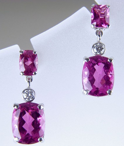 Tourmaline & diamond earrings in gold - Afghan red tourmaline (rubellite) earrings totalling 7.75ct set with 0.2ct diamonds in 18ct white gold.  Drops 22 x 8mm. 
