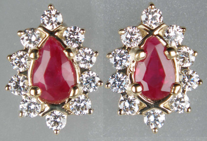 Ruby & diamond cluster earstuds in 9ct yellow gold - 0.49ct pair of pear cut rubies in a sparkling halo of brilliant cut white diamonds totalling 0.33ct, all in 9ct yellow gold