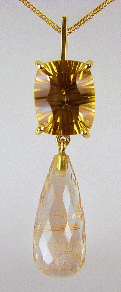 Citrine & rutilated quartz pendant - Rutilated quartz (also known as Venus hairstone) briolette drop with 3.53ct concave cut citrine in 18ct yellow gold. Pendant 9 x 40mm.