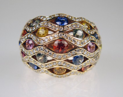 Multicolour sapphire & diamond ring in 18ct rose gold - 2.68ct of round cut sapphires in a wide variety of attractive colours, set with 0.99ct of round brilliant cut diamonds G colour VS clarity and mounted in 18ct rose gold