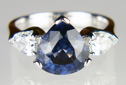 Spinel & diamond ring in 18ct white gold - 3.21ct deep blue pear cut spinel flanked by a 0.82ct matched pair of pear cut diamonds in G colour VS clarity. The gems are mounted in 18ct white gold