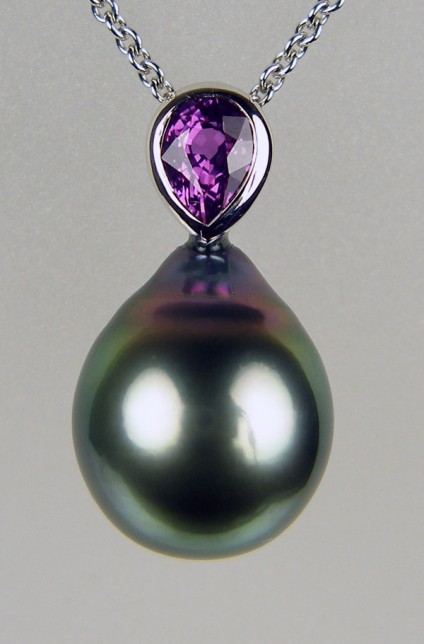 Tahitian pearl & purple sapphire pendant in white gold - 1.01ct pear cut purple sapphire rubover set in 9ct white gold with a drop shaped Tahitian pearl, set as a pendant