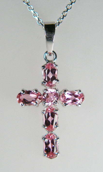 Pale pink tourmaline cross in 14ct white gold - Dainty cross with 6 pastel pink tourmalines claw set in 14ct gold. Cross is 28mm long & 12mm wide