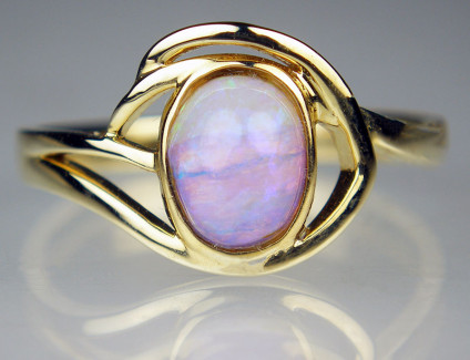 Crystal opal ring in 9ct yellow gold - Round crystal opal cabochon from Winton, Queensland, set in 9ct yellow gold ring.