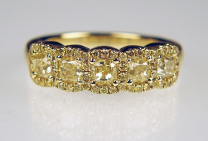 Yellow diamond 5 stone cluster ring in 18ct yellow gold - 5 matched yellow diamonds weighing 0.97ct and surrounded by 0.28ct of small brilliant cut round yellow diamonds in 18ct yellow gold ring.  If you like rich and vibrant gold, this shimmering confection is for you!